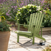Cottage Style Green Adirondack chair on a Slabbed path with garden flowers in the background